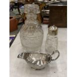 A GLASS DECANTER, A SUGAR SIFTER WITH PLATED LID PLUS A PLATED CREAM JUG