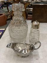 A GLASS DECANTER, A SUGAR SIFTER WITH PLATED LID PLUS A PLATED CREAM JUG