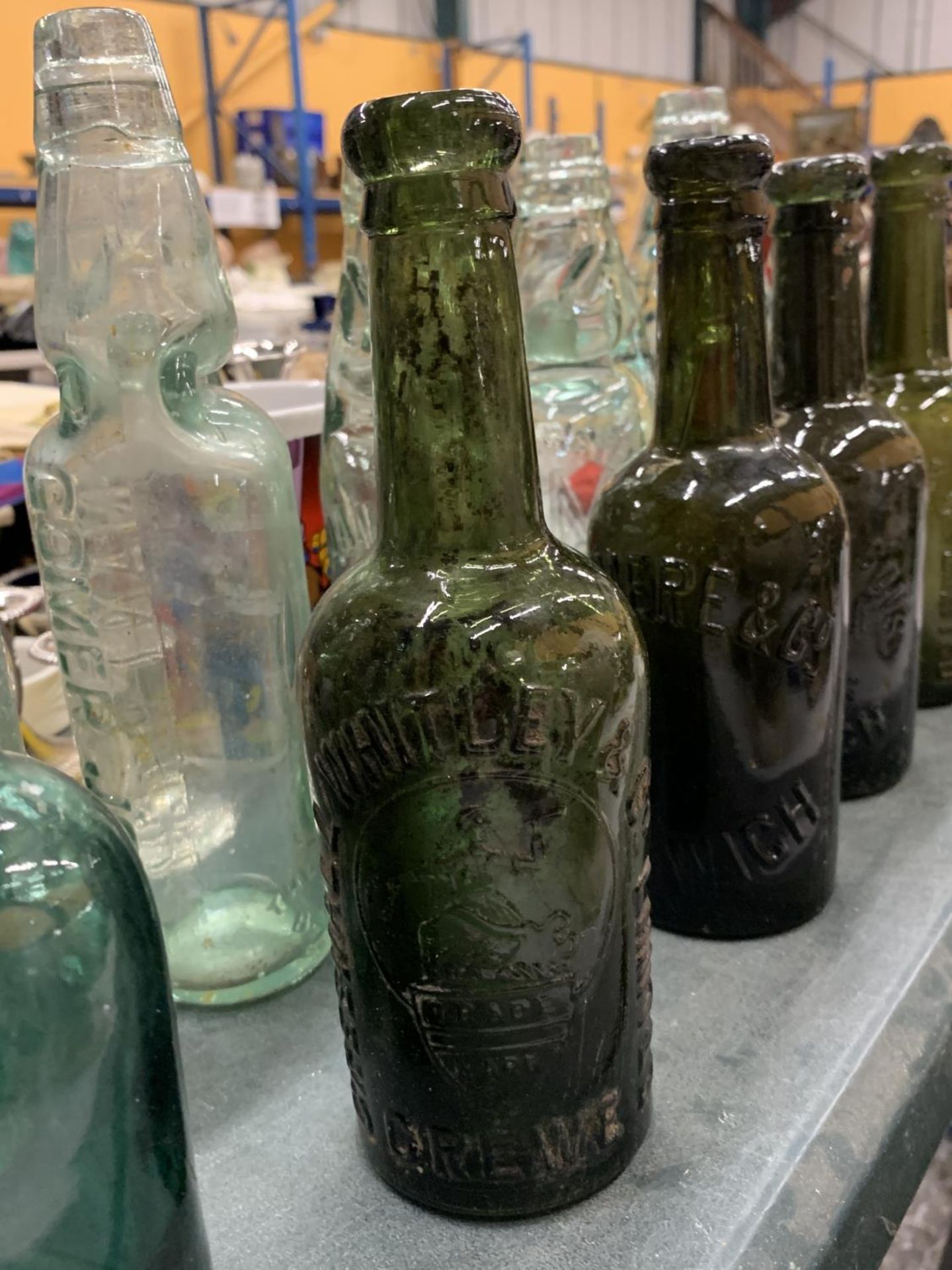 A COLLECTION OF VINTAGE BOTTLES TO INCLUDE GREEN BEER BOTTLES, CLEAR BOTTLES WITH MARBLE STOPPERS, - Image 2 of 3