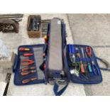 AN ASSORTMENT OF TOOLS TO INCLUDE PLIERS, SCREW DRIVERS AND WIRE STRIPPERS ETC