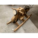 A WOODEN MOTORBIKE ROCKER