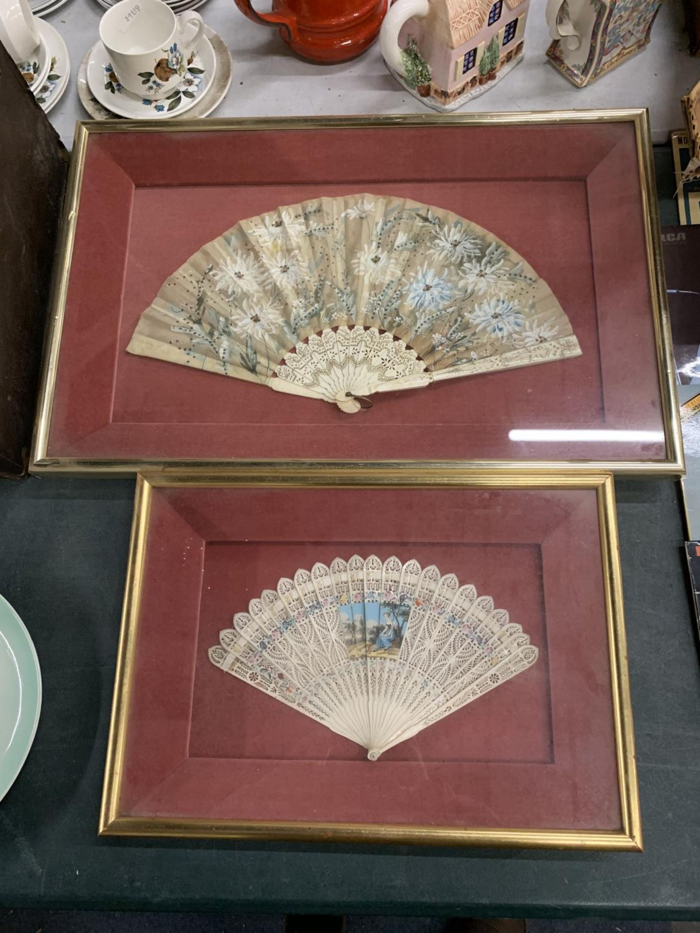 TWO VINTAGE FANS IN GLASS CASES, 60CM X 39CM AND 33CM X 30CM