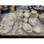 A MINTON 'DAINTY SPRAYS' DINNER SERVICE TO INCLUDE VARIOUS SIZES OF PLATES, SERVING PLATES, BOWLS,