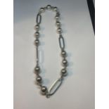 A SILVER BALL AND OVAL LINK NECLACE