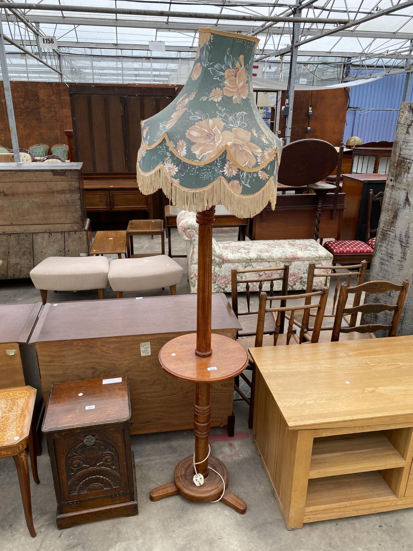 A MID 20TH CENTURY MAHOGANY STANDARD LAMP WITH MID HEIGHT SHELF COMPLETE SHADE