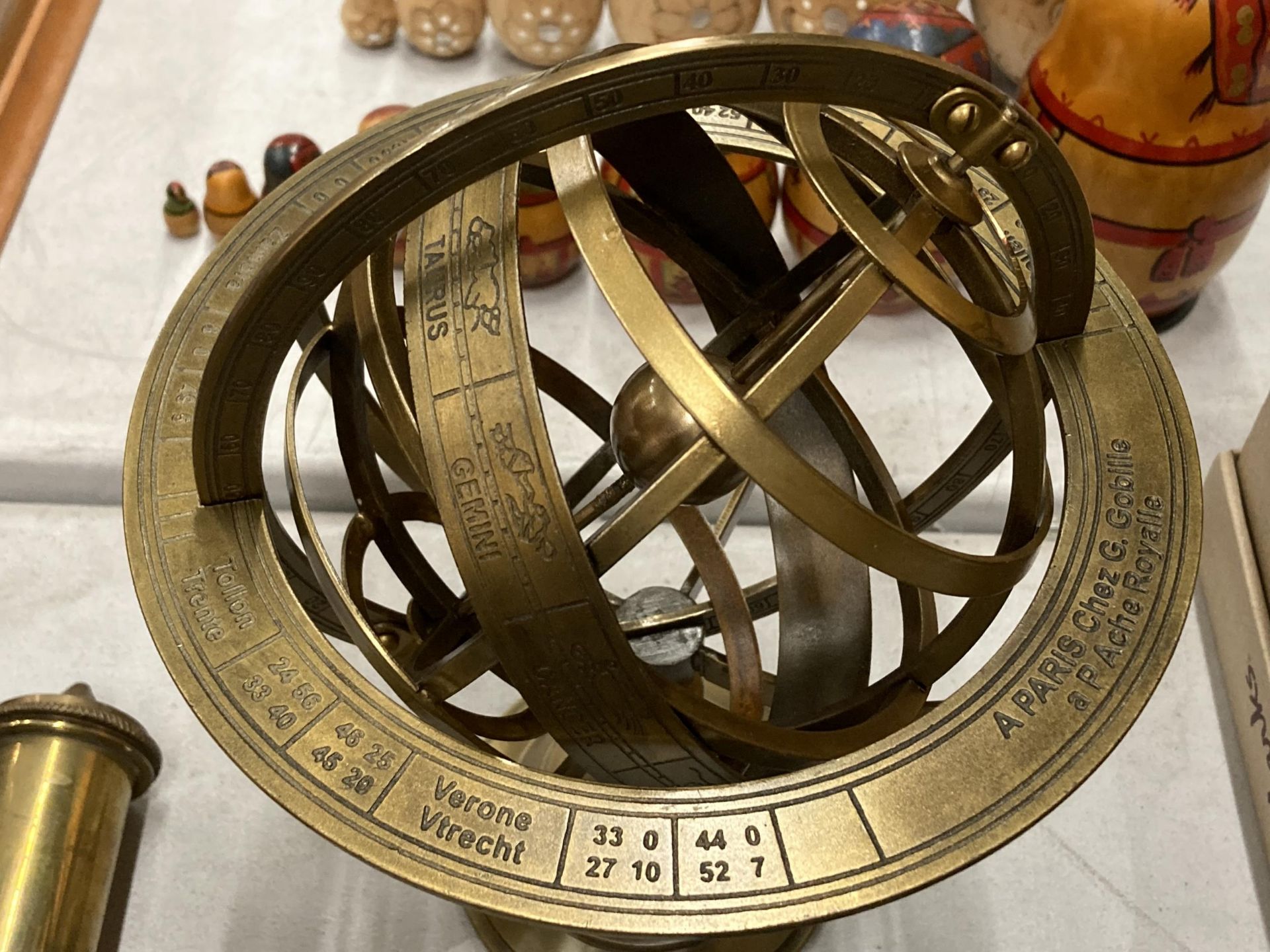 A BRASS REVOLVING GLOBE STYLE DESK COMPASS WITH BIRTH SIGNS - Image 2 of 4