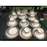 A FOLEY CHINA PART TEASET TO INCLUDE A LARGE AMOUNT OF CUPS, SAUCERS AND SIDE PLATES PLUS A CREAM