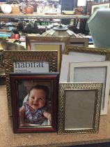 A QUANTITY OF MODERN PHOTO FRAMES - 7 IN TOTAL