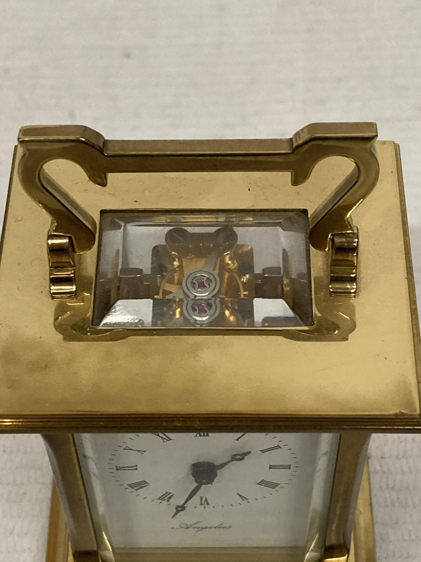 A VINTAGE ANGELUS FRENCH BRASS CASED CARRIAGE CLOCK - Image 2 of 4