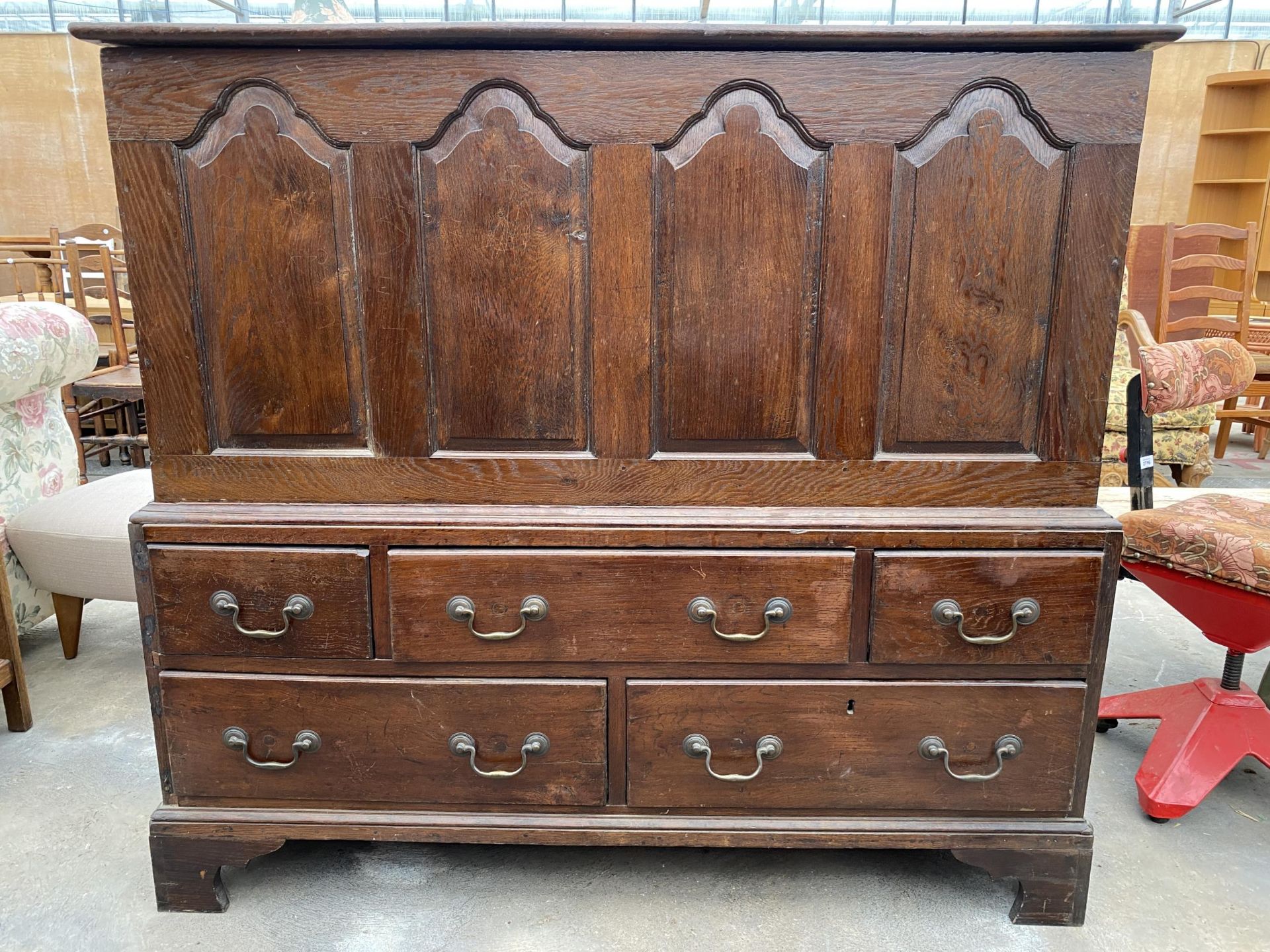 A GEORGIAN OAK FOUR PANEL MULE CHEST WITH FIVE DRAWERS TO THE BASE, 52" WIDE, ON BRACKET FEET - Image 7 of 7