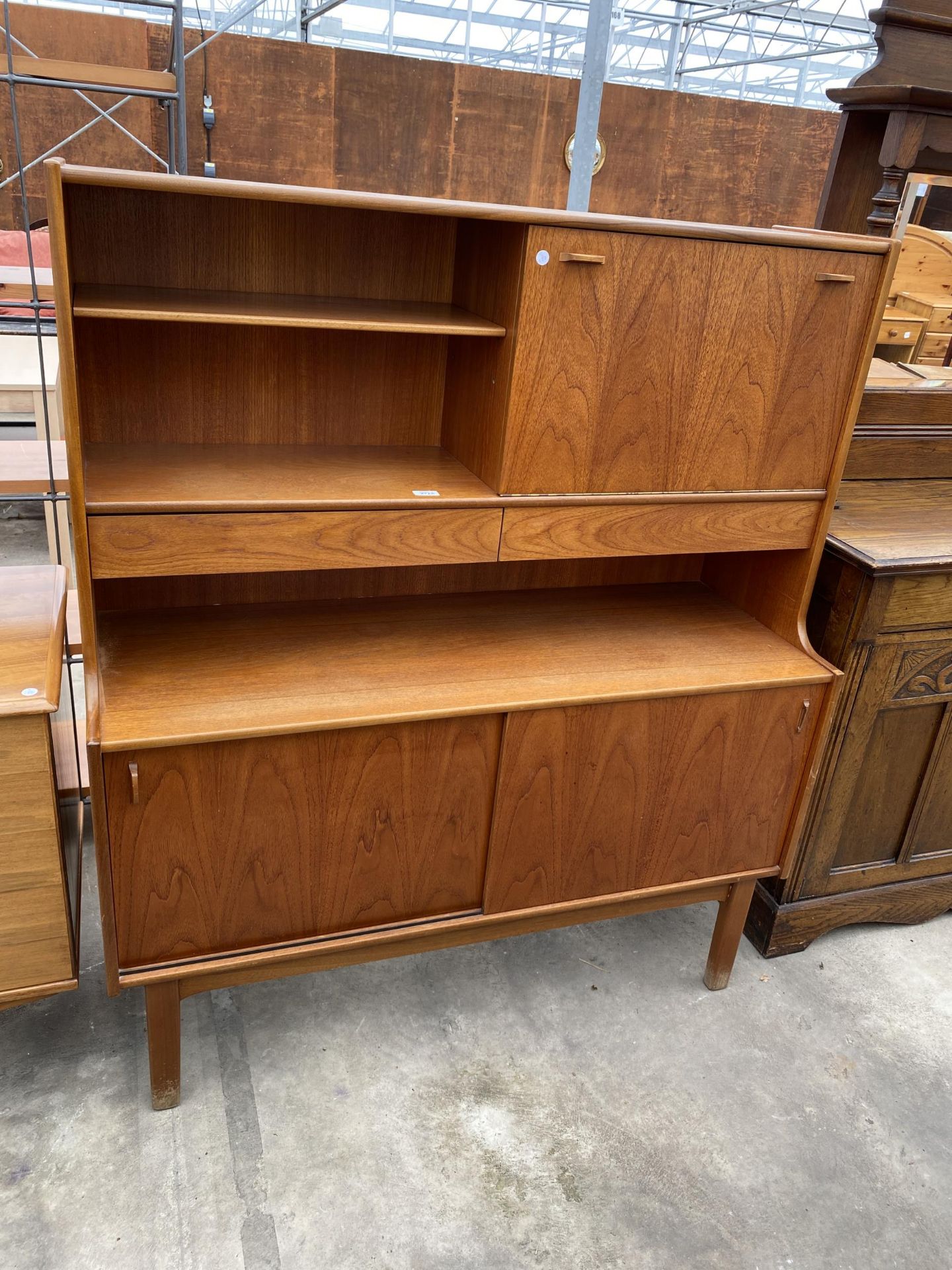 A RETRO TEAK COCKTAIL LOUNGE UNIT, 48" WIDE