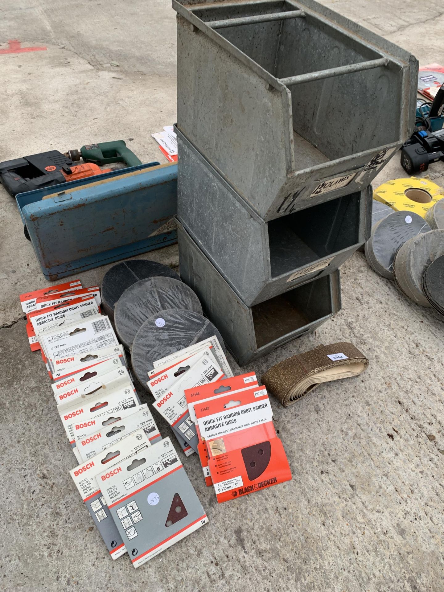 THREE GALVANISED STORAGE BOXES AND AN ASSORTMENT OF SANDING PADS