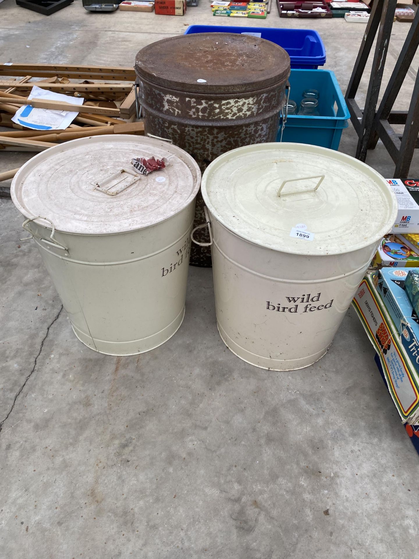 A PAIR OF ENAMEL WILD BIRD FOOD BINS AND A DOG FOOD BIN