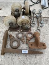 AN ASSORTMENT OF HARDWARE TO INCLUDE DOLLY WHEELS, LIFTING EYES AND A TOW BALL ETC