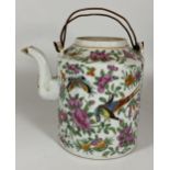 A 19TH CENTURY CHINESE CANTON FAMILLE ROSE TEAPOT WITH BUTTERFLY AND BIRD DECORATION, HEIGHT 16CM