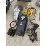 AN ASSORTMENT OF MOTORBIKE SPARES TO INCLUDE A FUEL TANK, EXHUAST PIPE AND MUD GUARD ETC
