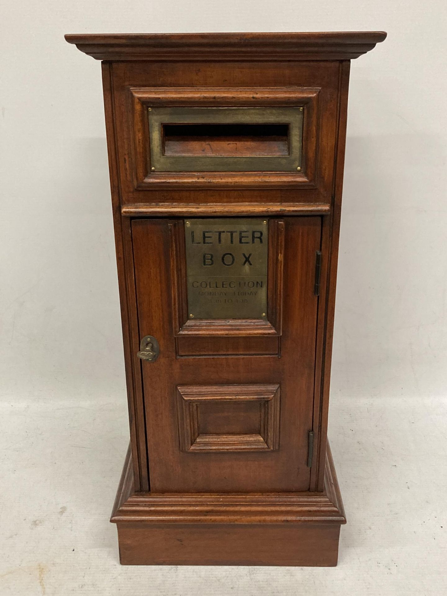 A MAHOGANY POST BOX IN THE GEORGIAN STYLE WITH SQUARE PANELLING AND BRASS PLAQUE