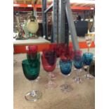 A COLLECTION OF CRANBERRY GLASS DRINKING GLASSES AND FURTHER GLASSES