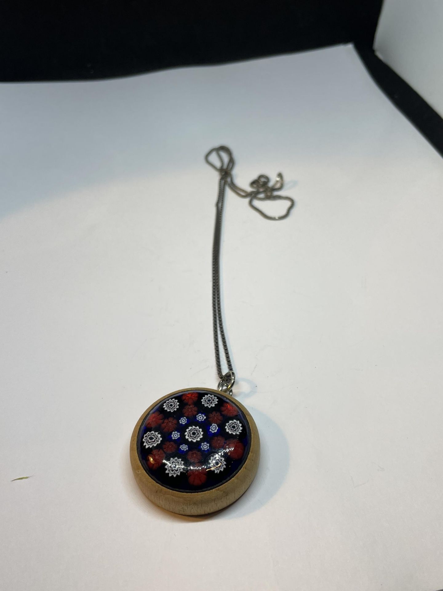 A SILVER NECKLACE WITH AN EDEN PROJECT MURANO GLASS PENDANT