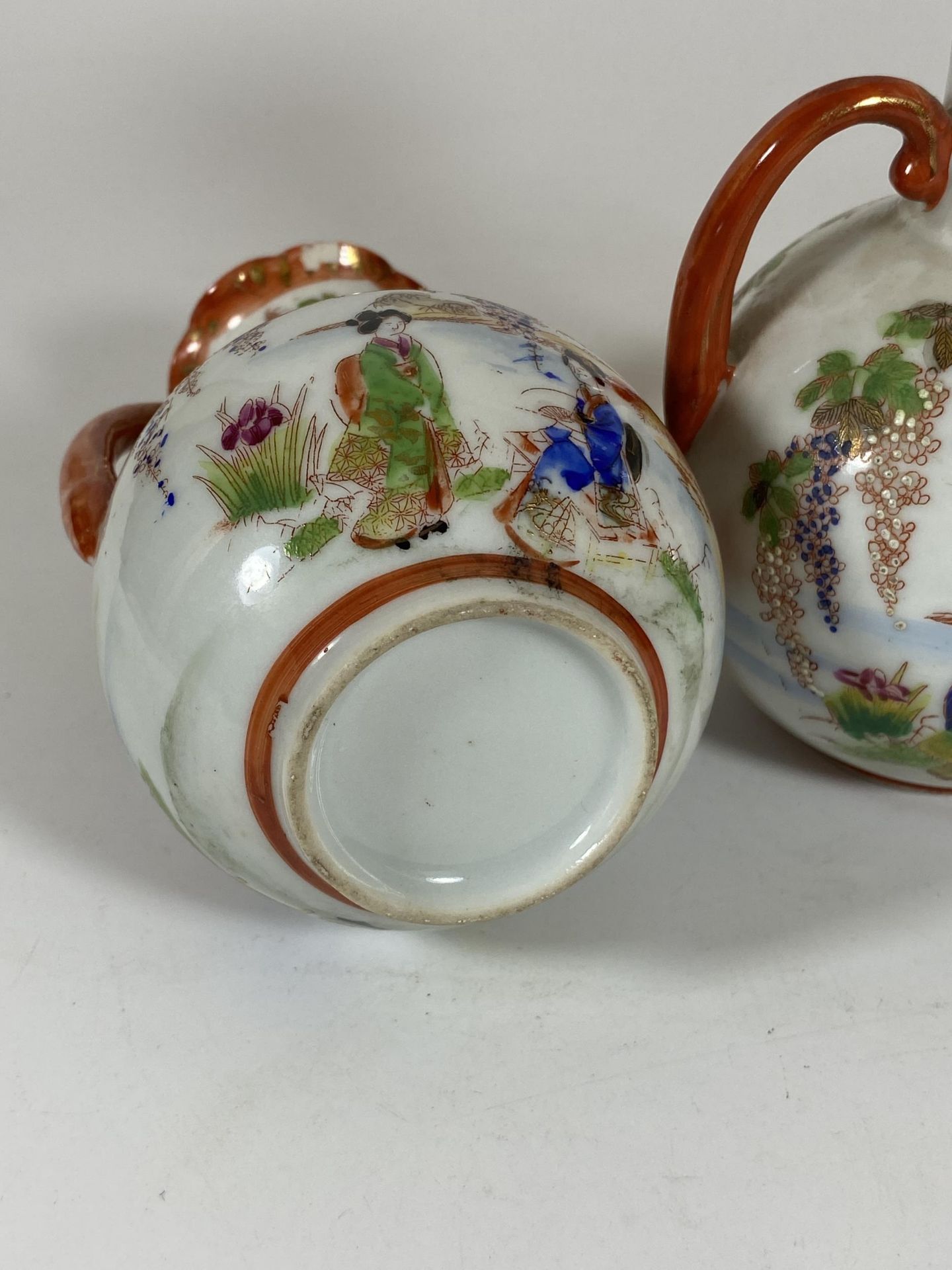 A PAIR OF JAPANESE TWIN HANDLED PORCELAIN VASES WITH LAKESIDE SCENE, HEIGHT 14CM - Image 5 of 6