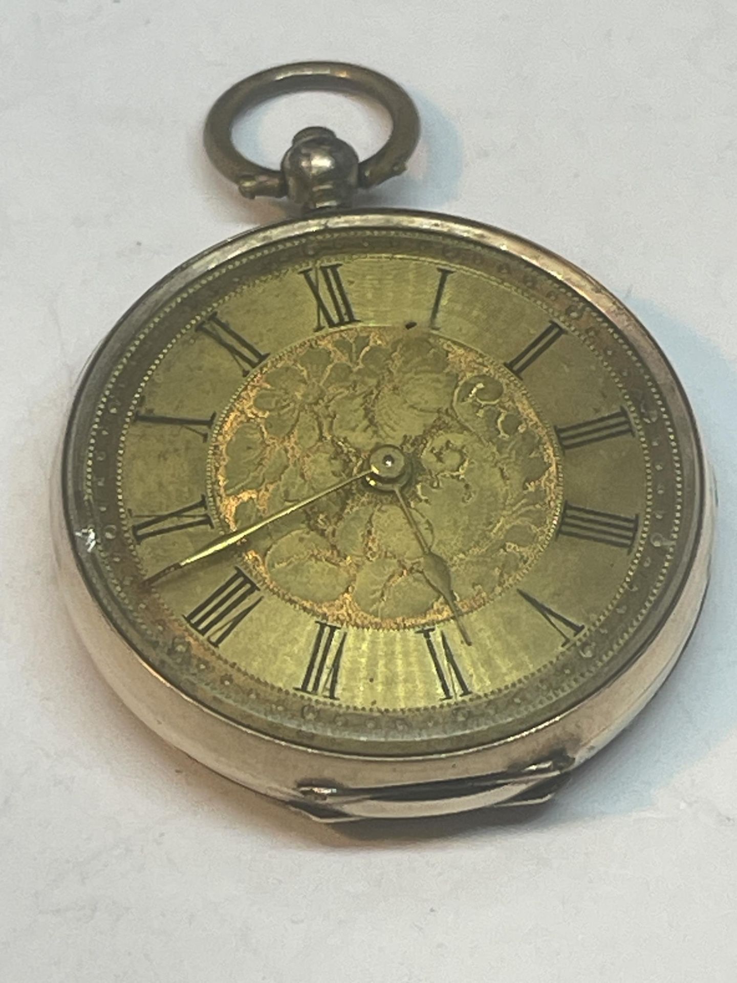 A 9CT GOLD LADIES OPEN FACED POCKET WATCH GROSS WEIGHT 30.63 GRAMS