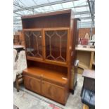 A McINTOSH RETRO TEAK LOUNGE UNIT WITH GLAZED DOORS TO THE UPPER PORTION, WITH CUPBOARDS AND DRAWERS