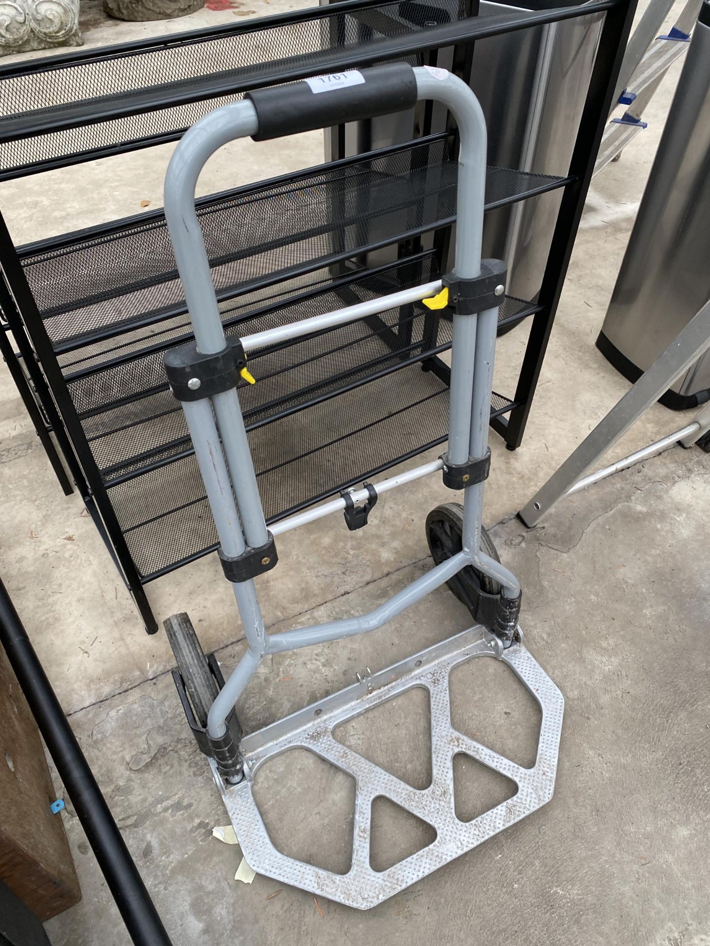 A FOLDING TWO WHEELED SACK TRUCK