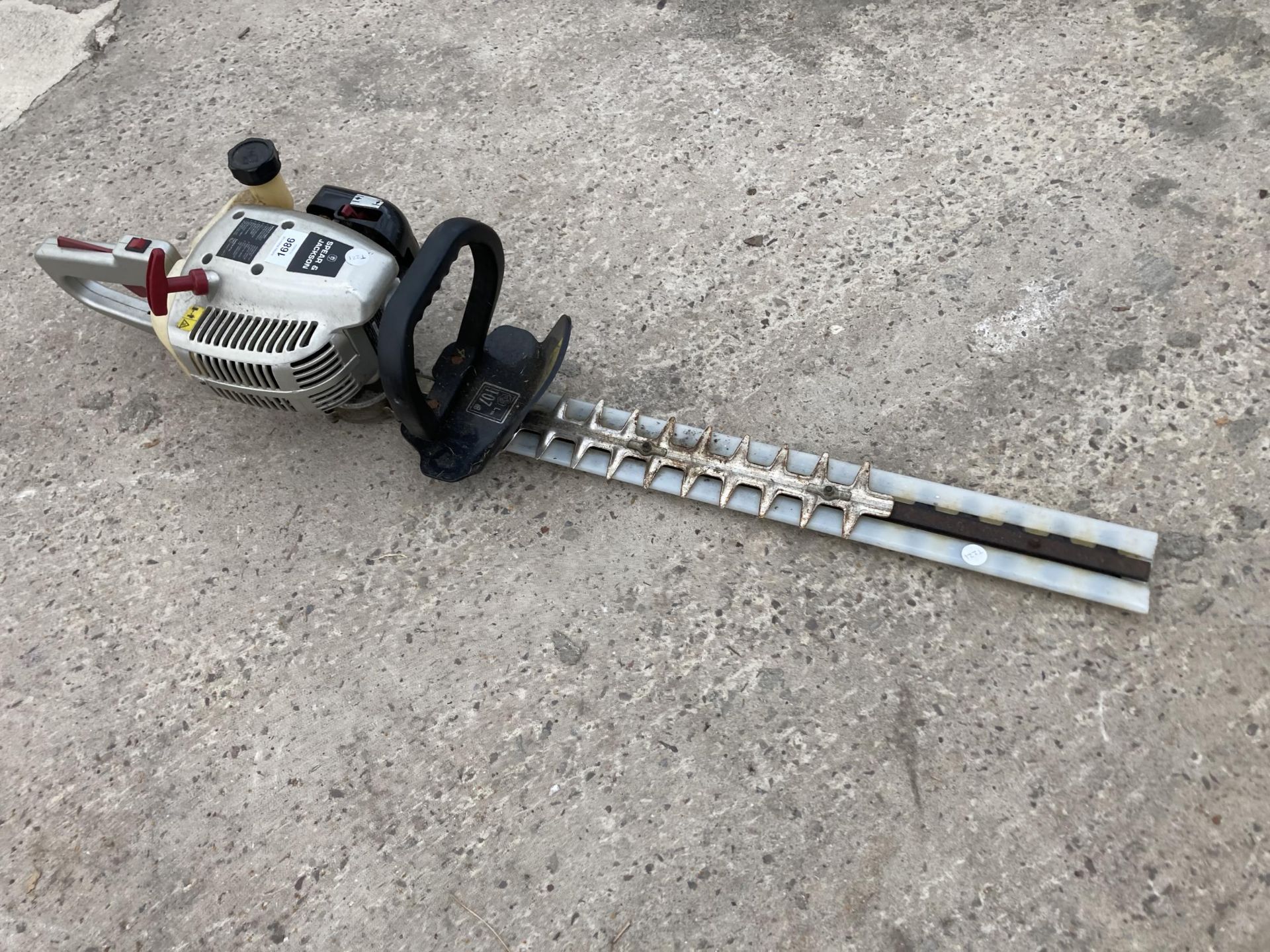 A PETROL SPEAR AND JACKSON HEDGE TRIMMER