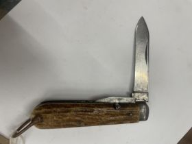 A VINTAGE SHEFFIELD POCKET KNIFE INDISTINCT MAKERS MARK