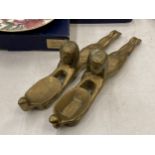 A PAIR OF BRASS EGYPTIAN LADIES