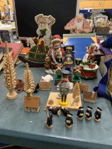 A QUANTITY OF WOODEN CHRISTMAS ITEMS TO INCLUDE A MUSICAL ROCKING HORSE, CHOIR SINGERS, SNATA,