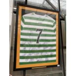 A FRAMED CELTIC FC FOOTBALL SHIRT BEARING VARIOUS AUTOGRAPHS