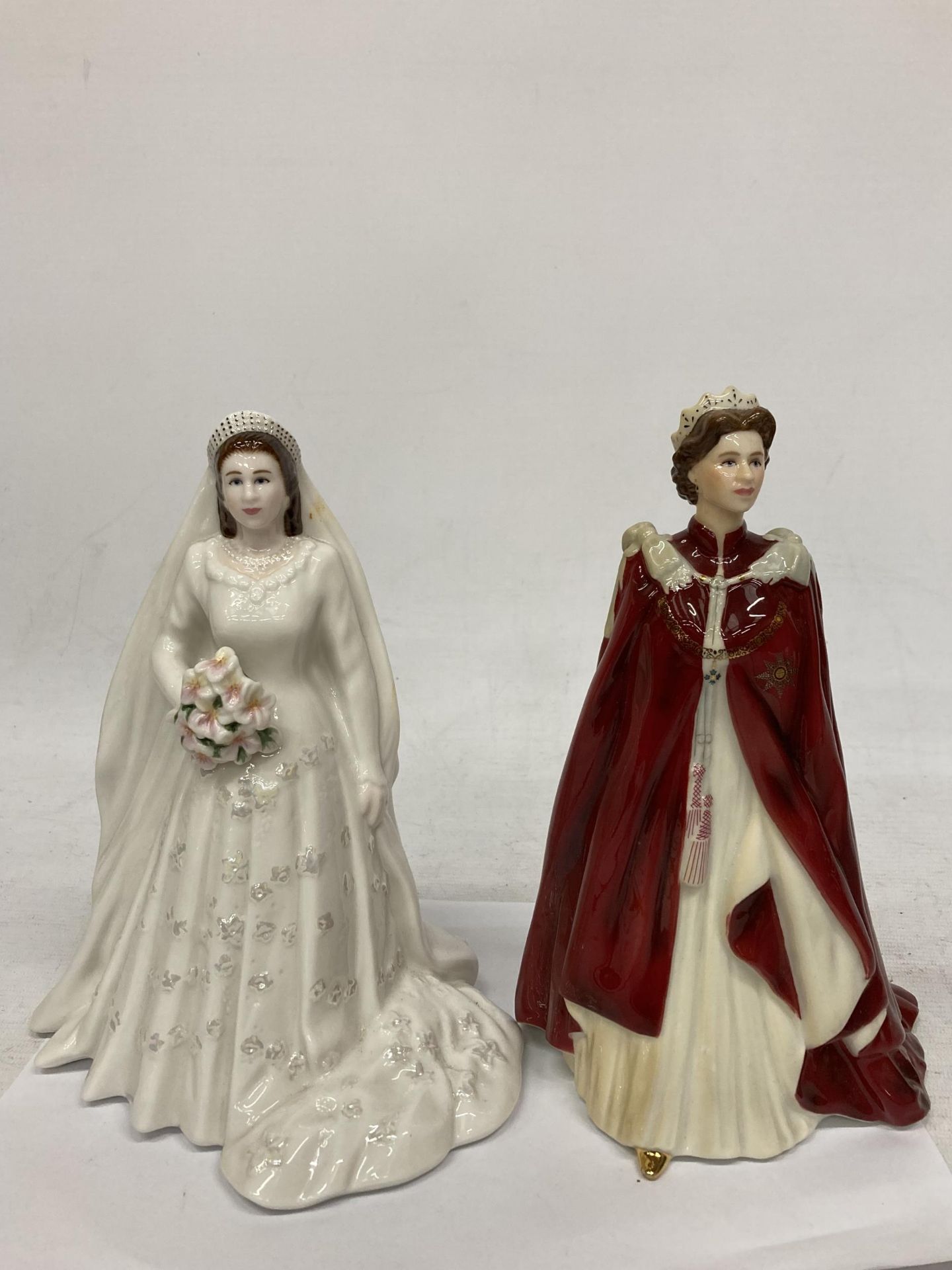 TWO ROYAL WORCESTER FIGURES - HER MAJESTY QUEEN ELIZABETH II WEDDING ANNIVERSARY & THE QUEENS 80TH