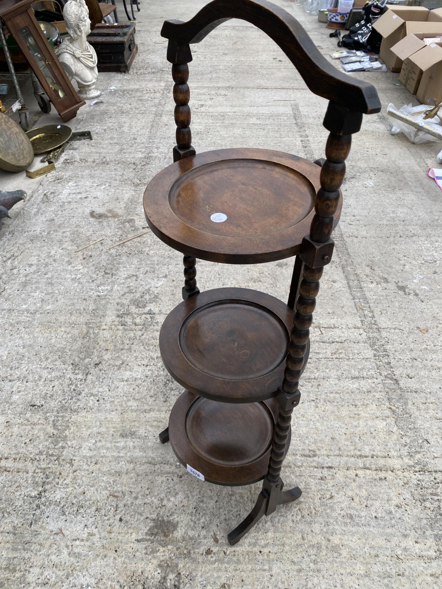 A VINTAGE THREE TIER OAK FOLDING PLANT STAND