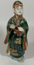 A 19TH CENTURY JAPANESE STONWARE FIGURE, HEIGHT 24.5CM