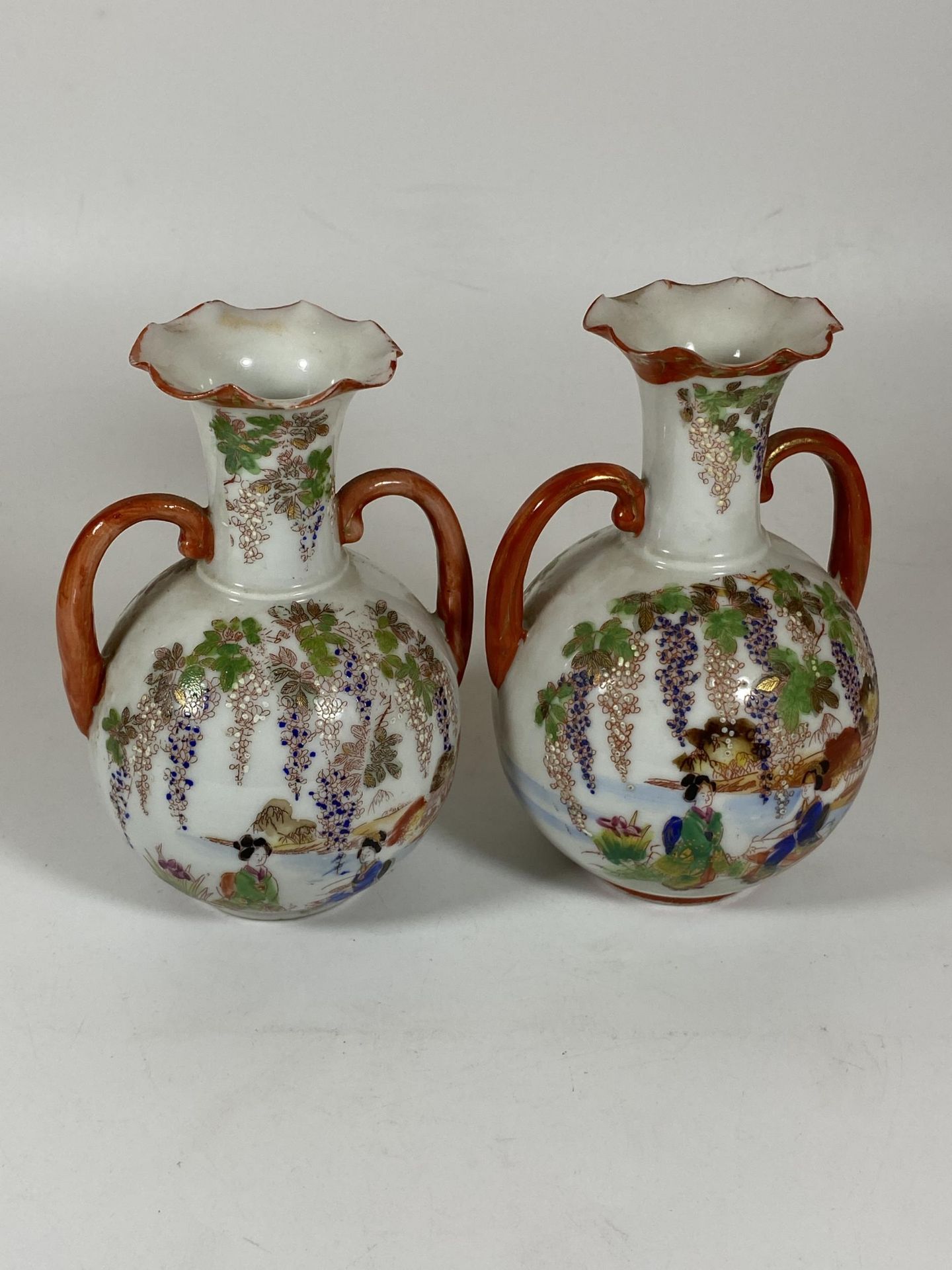 A PAIR OF JAPANESE TWIN HANDLED PORCELAIN VASES WITH LAKESIDE SCENE, HEIGHT 14CM - Image 4 of 6