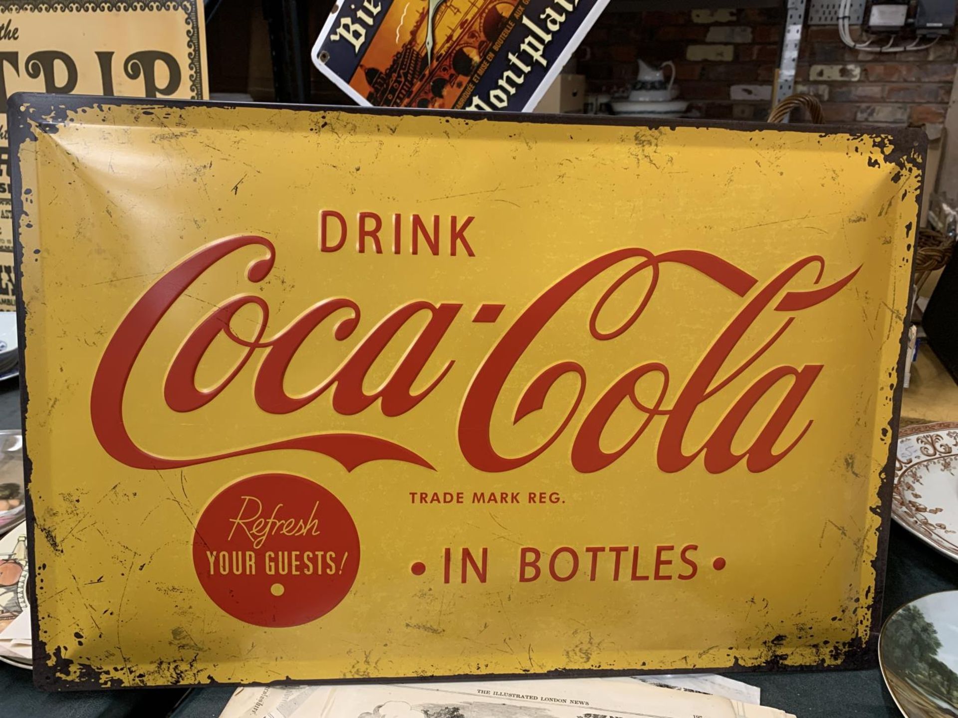 A LARGE METAL COCA-COLA SIGN 40CM X 60CM