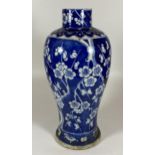 A LARGE LATE 19TH CENTURY CHINESE QING BLUE AND WHITE PRUNUS BLOSSOM BALUSTER FORM VASE, FOUR