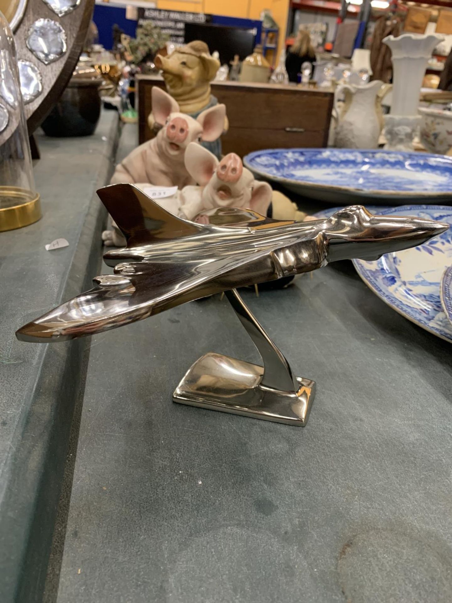 A CHROME VULCAN BOMBER ON A PLINTH, HEIGHT 13CM