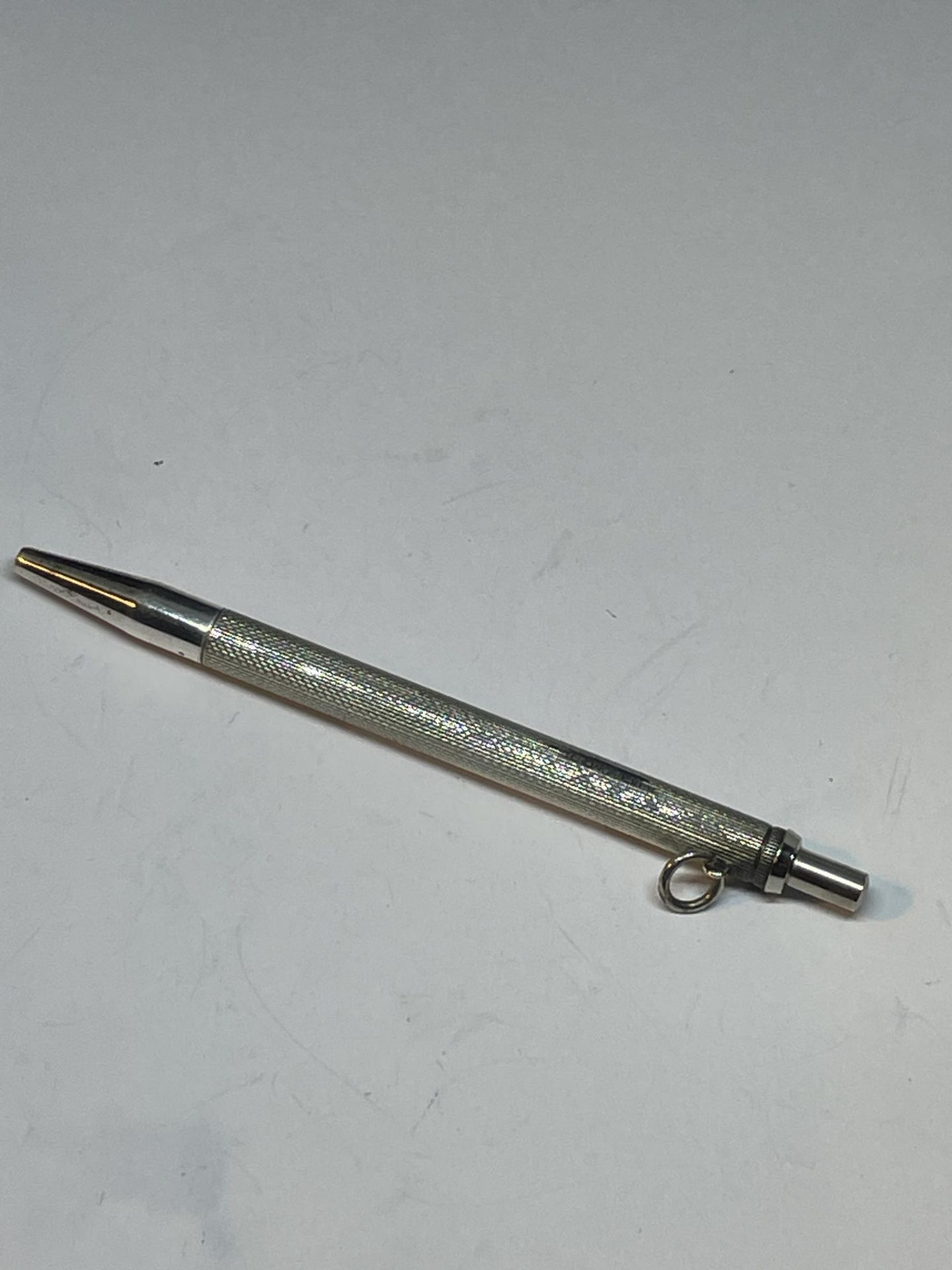 A MARKED STERLING SILVER PENCIL