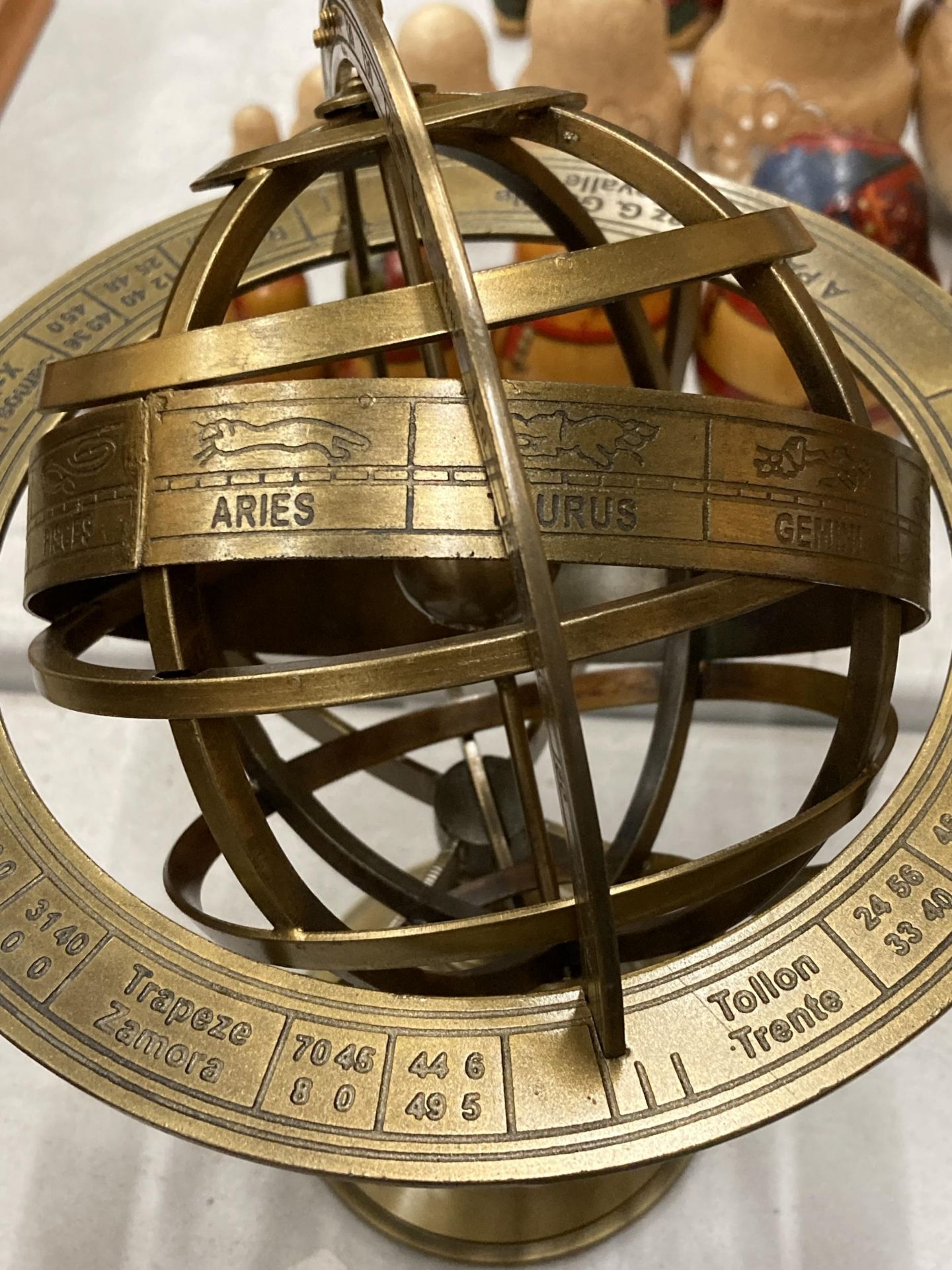 A BRASS REVOLVING GLOBE STYLE DESK COMPASS WITH BIRTH SIGNS - Image 3 of 4