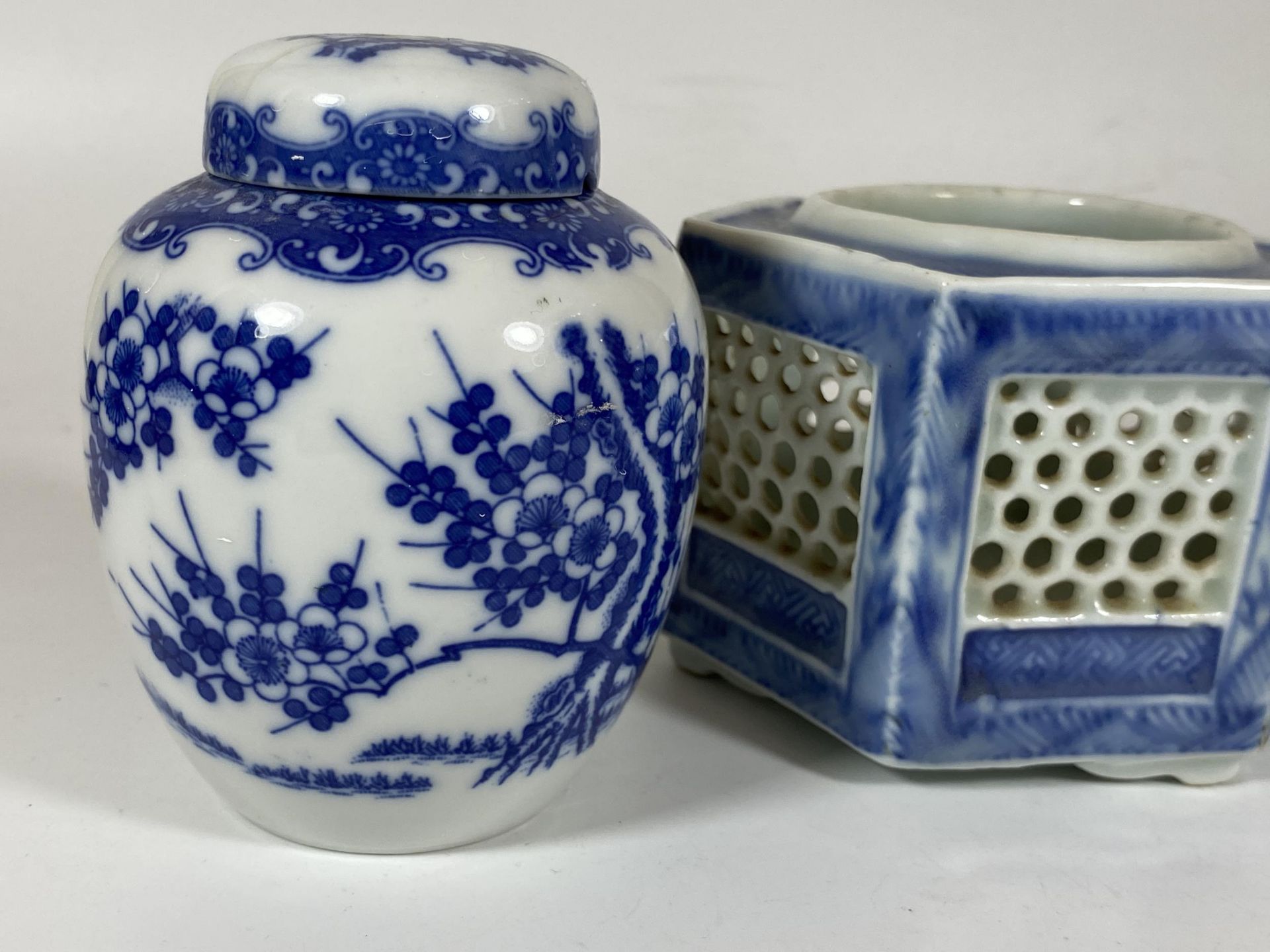 THREE ITEMS - A PAIR OF JAPANESE BLUE AND WHITE FLORAL GINGER JARS AND A RETICULATED POT, HEIGHT - Image 2 of 5