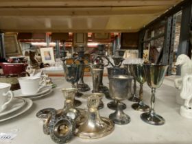 A MIXED LOT OF SILVER PLATED ITEMS - GOBLETS, PAIR OF CANDLEABRA ETC