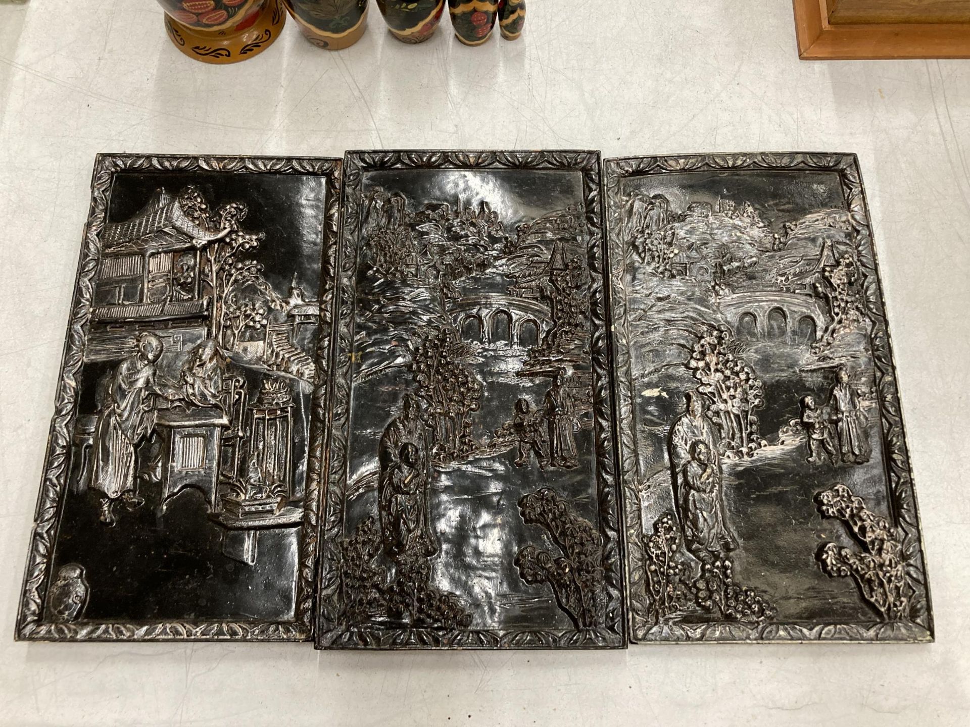 A GROUP OF THREE ETCHED ORIENTAL PANELS