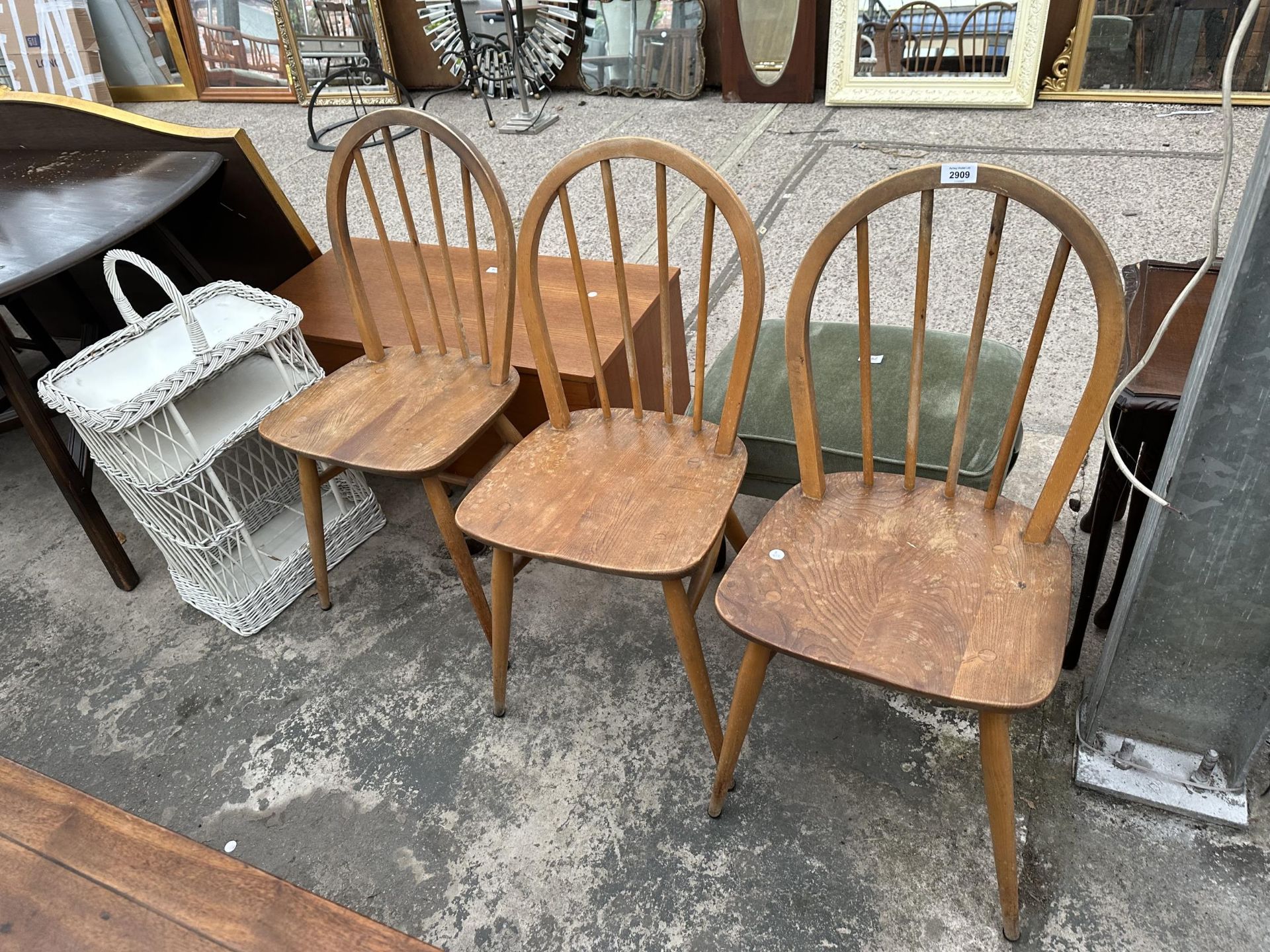 THREE ERCOL BLUE LABEL ELM AND BEECH WINDSOR STYLE CHAIRS AND WICKER SIX BOTTLE WINE CARRIER