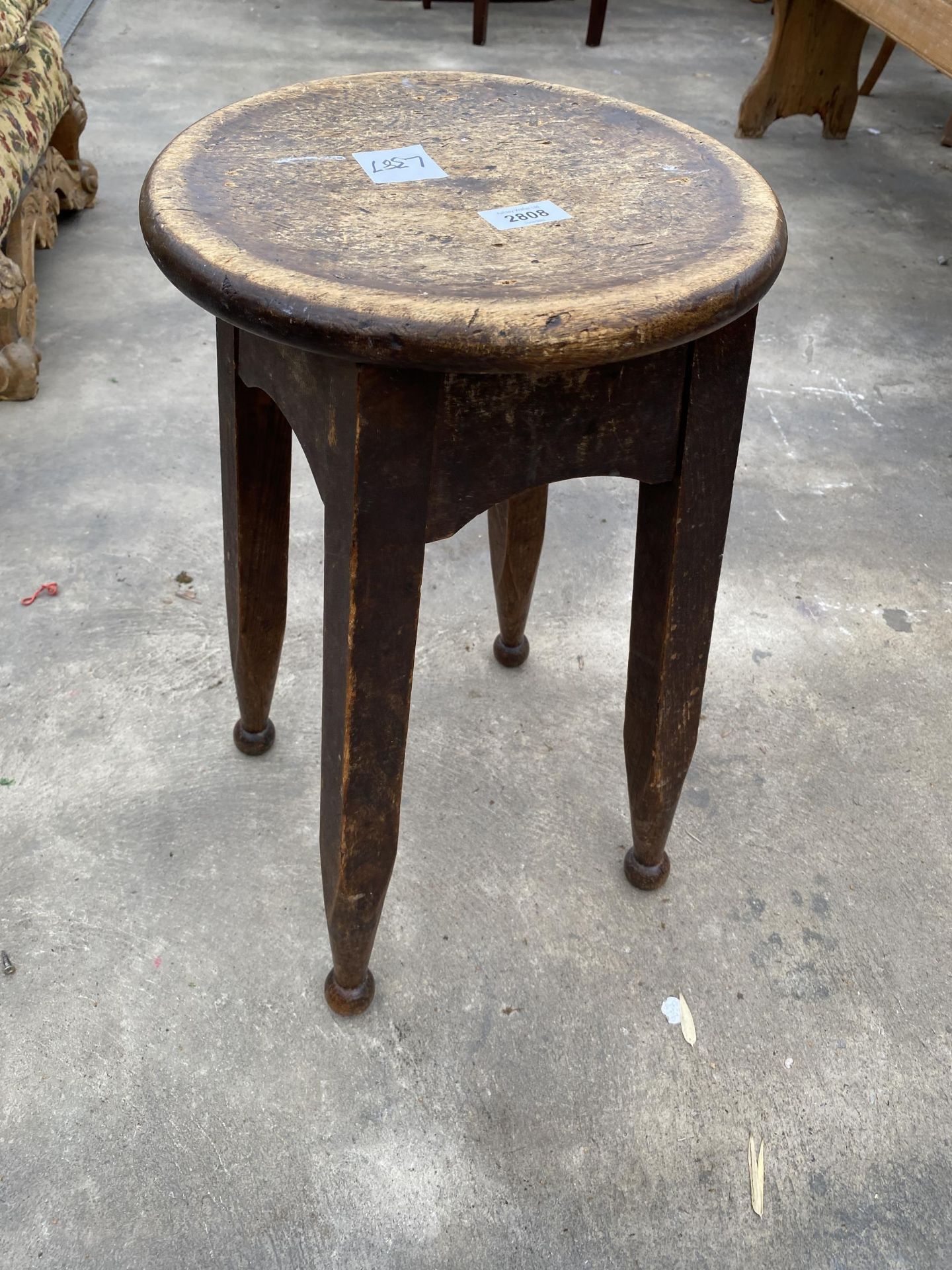 A MID 20TH CENTURY 11.5" DIAMETER BEECH STOOL