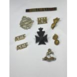 NINE VARIOUS MILITARY BADGES