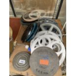 AN ASSORTMENT OF CINE REELS AND REEL HOLDERS