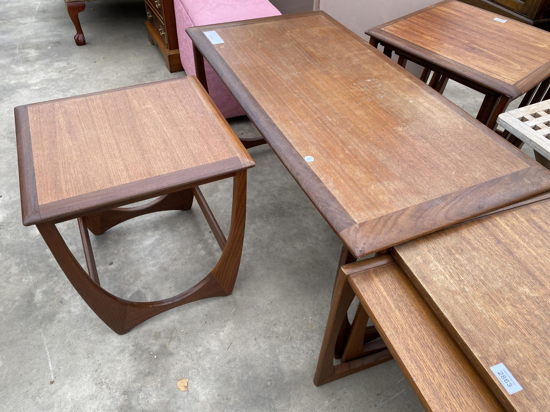 A RETRO TEAK NEST OF TWO TABLES AND A PART NEST OF THREE TABLES - Image 2 of 3