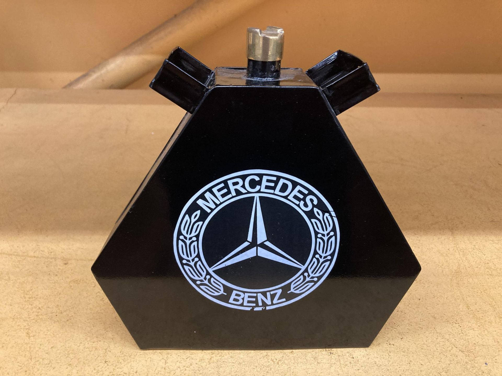 A SMALL MERCEDES BLACK PETROL CAN, HEIGHT 21CM